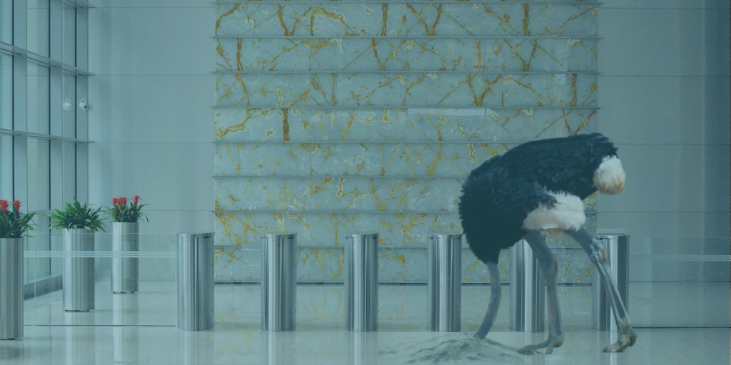 Ostrich with head buried in floor of modern office building with sheer teal overlay