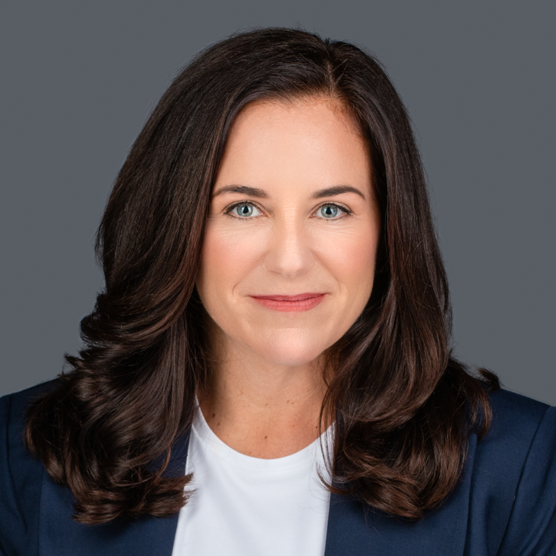 Picture of smiling woman in blazer